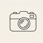 Black outline of a camera with lens and wrist strap